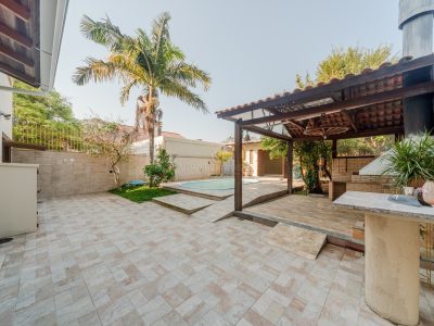 Casa à venda com 3 dormitórios, 257m² e 3 vagas no bairro Ipanema, Zona Sul de Porto Alegre