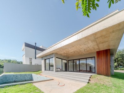 Casa em Condomínio à venda com 3 dormitórios, 357m² e 2 vagas no bairro Alphaville, Zona Sul de Porto Alegre