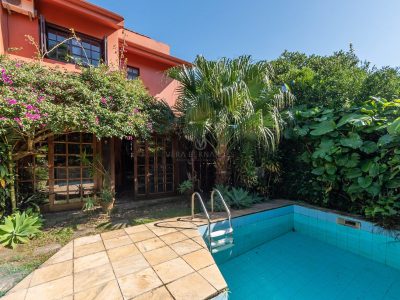 Casa à venda com 4 dormitórios, 250m² e 2 vagas no bairro Jardim Isabel, Zona Sul de Porto Alegre