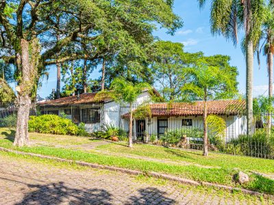 Casa à venda com 3 dormitórios, 450m² e 4 vagas no bairro Jardim Isabel, Zona Sul de Porto Alegre