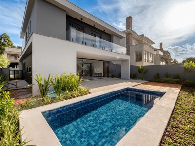 Casa em Condomínio à venda com 3 dormitórios, 232m² e 2 vagas no bairro Alphaville, Zona Sul de Porto Alegre