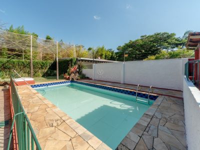 Casa à venda com 4 dormitórios, 338m² e 4 vagas no bairro Ipanema, Zona Sul de Porto Alegre