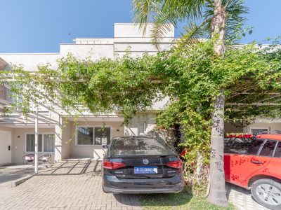 Casa em Condomínio à venda com 4 dormitórios, 191m² e 2 vagas no bairro Vila Nova, Zona Sul de Porto Alegre
