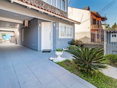 Casa à venda com 3 dormitórios, 183m² e 3 vagas no bairro Hípica, Zona Sul de Porto Alegre
