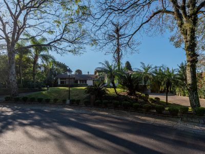 Casa em Condomínio à venda com 3 dormitórios, 400m² e 4 vagas no bairro Jardim do Sol, Zona Sul de Porto Alegre