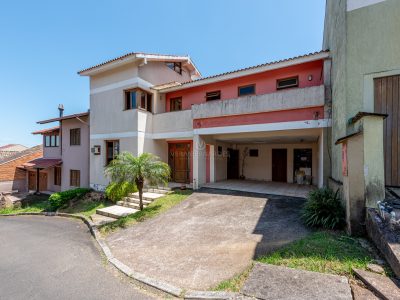 Casa em Condomínio à venda com 4 dormitórios, 267m² e 4 vagas no bairro Cavalhada, Zona Sul de Porto Alegre