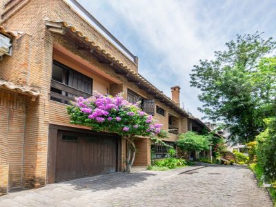 Casa em Condomínio à venda com 4 dormitórios, 331m² e 2 vagas no bairro Tristeza, Zona Sul de Porto Alegre