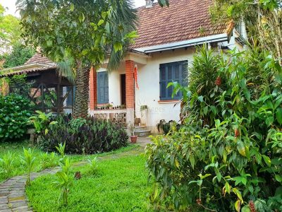 Casa à venda com 3 dormitórios, 175m² e 10 vagas no bairro Jardim Isabel, Zona Sul de Porto Alegre