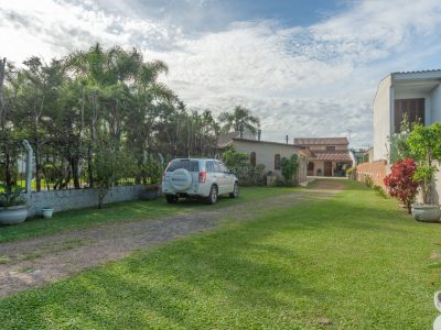 Casa à venda com 5 dormitórios, 250m² e 6 vagas no bairro Hípica, Zona Sul de Porto Alegre