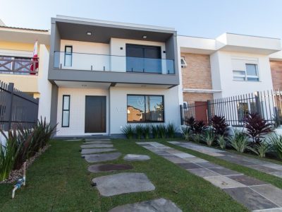 Casa à venda com 3 dormitórios, 140m² e 2 vagas no bairro Aberta dos Morros, Zona Sul de Porto Alegre