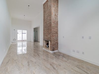Casa em Condomínio à venda com 3 dormitórios, 107m² e 2 vagas no bairro Hípica, Zona Sul de Porto Alegre