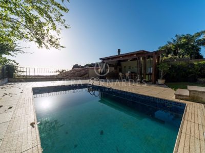 Casa à venda com 3 dormitórios, 467m² e 4 vagas no bairro Jardim Isabel, Zona Sul de Porto Alegre