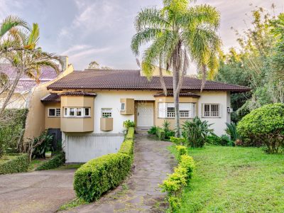 Casa à venda com 4 dormitórios, 552m² e 2 vagas no bairro Jardim Isabel, Zona Sul de Porto Alegre