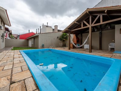 Casa à venda com 4 dormitórios, 228m² e 4 vagas no bairro Ipanema, Zona Sul de Porto Alegre