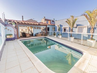 Casa à venda com 3 dormitórios, 333m² e 3 vagas no bairro Ipanema, Zona Sul de Porto Alegre