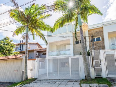 Casa à venda com 3 dormitórios, 210m² e 2 vagas no bairro Imperial Park, Zona Sul de Porto Alegre