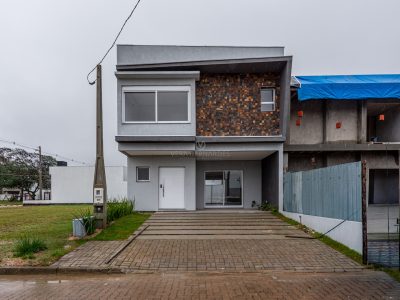 Casa em Condomínio à venda com 3 dormitórios, 140m² e 2 vagas no bairro Hípica, Zona Sul de Porto Alegre