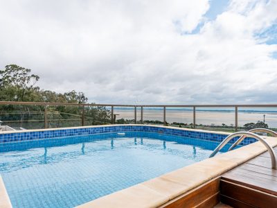 Cobertura Horizontal à venda com 3 dormitórios, 289m² e 2 vagas no bairro Santa Tereza, Zona Sul de Porto Alegre