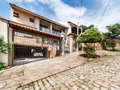 Casa à venda com 3 dormitórios, 227m² e 2 vagas no bairro Ipanema, Zona Sul de Porto Alegre