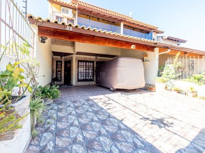 Casa à venda com 3 dormitórios, 202m² e 2 vagas no bairro Cavalhada, Zona Sul de Porto Alegre