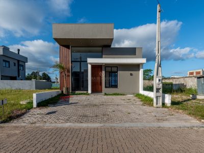 Casa em Condomínio à venda com 3 dormitórios, 100m² e 2 vagas no bairro Hípica, Zona Sul de Porto Alegre