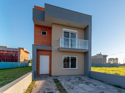 Casa em Condomínio à venda com 3 dormitórios, 113m² e 2 vagas no bairro Hípica, Zona Sul de Porto Alegre