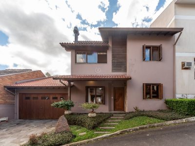 Casa em Condomínio à venda com 4 dormitórios, 260m² e 3 vagas no bairro Cavalhada, Zona Sul de Porto Alegre