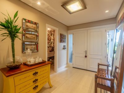 Casa em Condomínio à venda com 3 dormitórios, 366m² e 4 vagas no bairro Terra Ville, Zona Sul de Porto Alegre