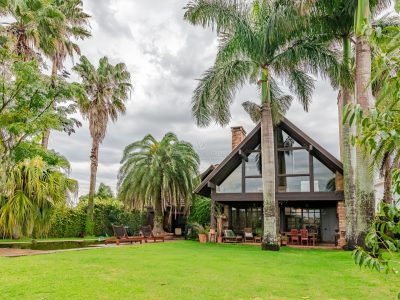 Casa em Condomínio à venda com 5 dormitórios, 500m² e 4 vagas no bairro Terra Ville, Zona Sul de Porto Alegre
