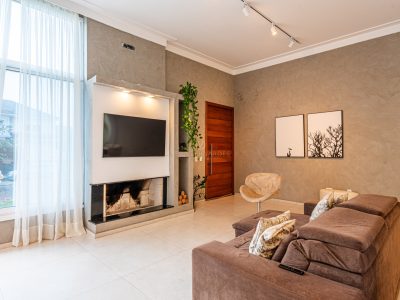 Casa à venda com 3 dormitórios, 156m² e 2 vagas no bairro Espírito Santo, Zona Sul de Porto Alegre