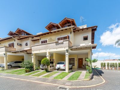 Casa em Condomínio à venda com 3 dormitórios, 182m² e 2 vagas no bairro Cavalhada, Zona Sul de Porto Alegre