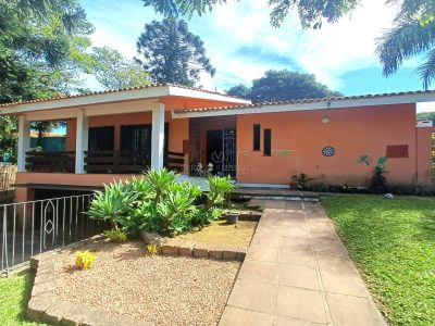 Casa à venda com 3 dormitórios, 325m² e 4 vagas no bairro Jardim Isabel, Zona Sul de Porto Alegre