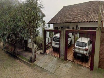 Casa à venda com 4 dormitórios, 315m² e 2 vagas no bairro Vila Conceição, Zona Sul de Porto Alegre