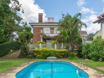 Casa à venda com 3 dormitórios, 321m² e 4 vagas no bairro Jardim Isabel, Zona Sul de Porto Alegre