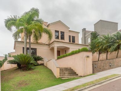 Casa em Condomínio à venda com 4 dormitórios, 540m² e 4 vagas no bairro Alphaville, Zona Sul de Porto Alegre