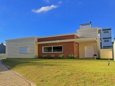Casa em Condomínio à venda com 3 dormitórios, 123m² e 2 vagas no bairro Lagos de Nova Ipanema, Zona Sul de Porto Alegre