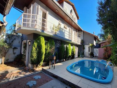 Casa à venda com 4 dormitórios, 334m² e 2 vagas no bairro Jardim Isabel em Porto Alegre