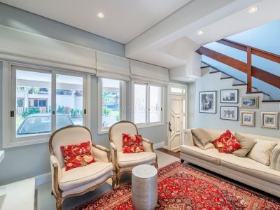 Casa em Condomínio à venda com 3 dormitórios, 184m² e 2 vagas no bairro Pedra Redonda, Zona Sul de Porto Alegre