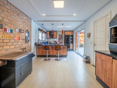 Casa à venda com 2 dormitórios, 453m² e 4 vagas no bairro Espírito Santo, Zona Sul de Porto Alegre