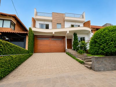 Casa em Condomínio à venda com 3 dormitórios, 290m² e 3 vagas no bairro Espírito Santo, Zona Sul de Porto Alegre