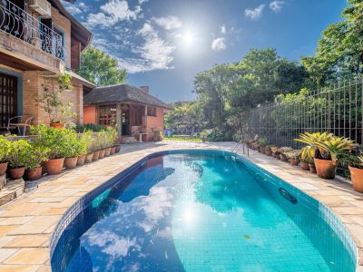 Casa em Condomínio à venda com 5 dormitórios, 604m² e 3 vagas no bairro Jardim Isabel, Zona Sul de Porto Alegre