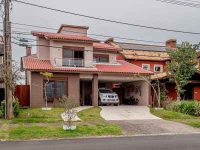 Casa em Condomínio à venda com 4 dormitórios, 226m² e 4 vagas no bairro Terra Ville, Zona Sul de Porto Alegre
