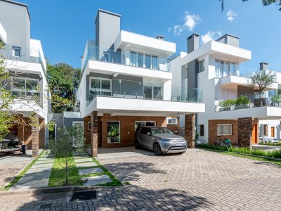 Casa em Condomínio à venda com 3 dormitórios, 295m² e 3 vagas no bairro Pedra Redonda, Zona Sul de Porto Alegre