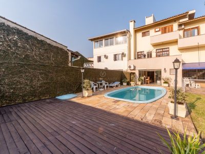 Casa à venda com 3 dormitórios, 310m² e 2 vagas no bairro Teresópolis, Zona Sul de Porto Alegre