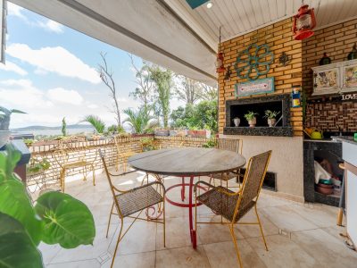 Casa em Condomínio à venda com 3 dormitórios, 302m² e 2 vagas no bairro Jardim Isabel, Zona Sul de Porto Alegre