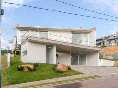 Casa em Condomínio à venda com 4 dormitórios, 320m² e 2 vagas no bairro Alphaville, Zona Sul de Porto Alegre