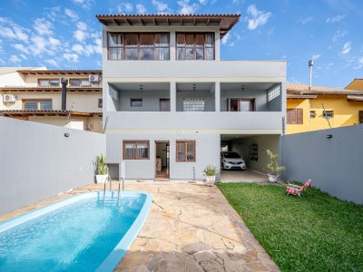 Casa à venda com 5 dormitórios, 359m² e 3 vagas no bairro Guarujá, Zona Sul de Porto Alegre