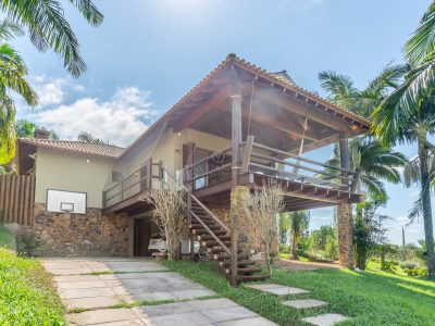 Casa em Condomínio à venda com 3 dormitórios, 250m² e 4 vagas no bairro Vila Nova, Zona Sul de Porto Alegre