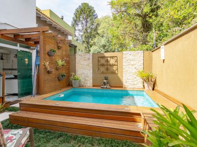 Casa à venda com 3 dormitórios, 190m² e 3 vagas no bairro Jardim Isabel, Zona Sul de Porto Alegre