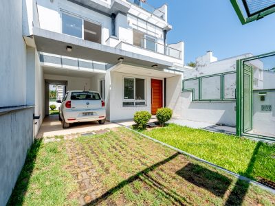 Casa em Condomínio à venda com 3 dormitórios, 212m² e 2 vagas no bairro Hípica, Zona Sul de Porto Alegre